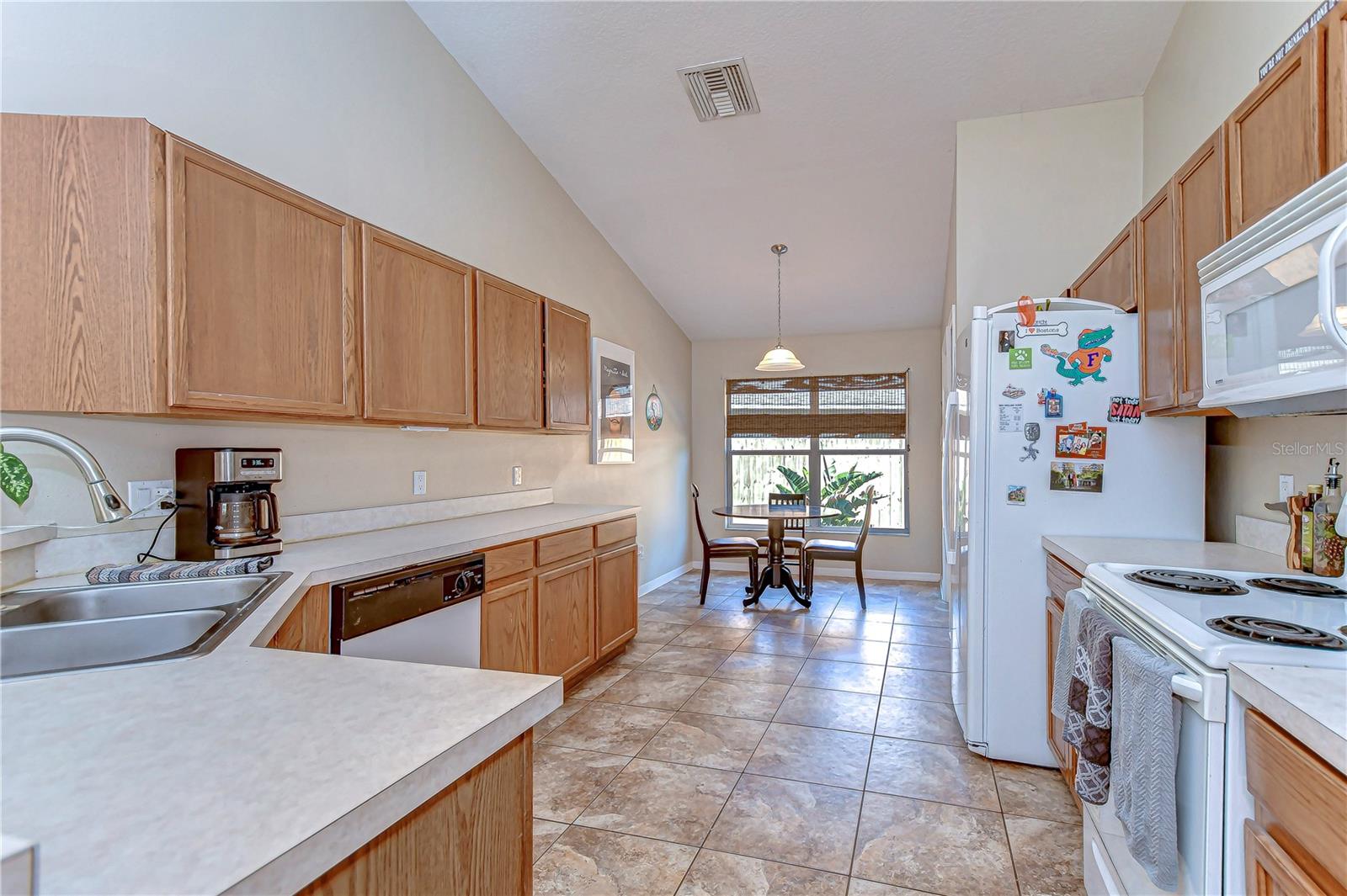 Expansive countertops and ample cabinetry ensure plenty of room for culinary creativity.