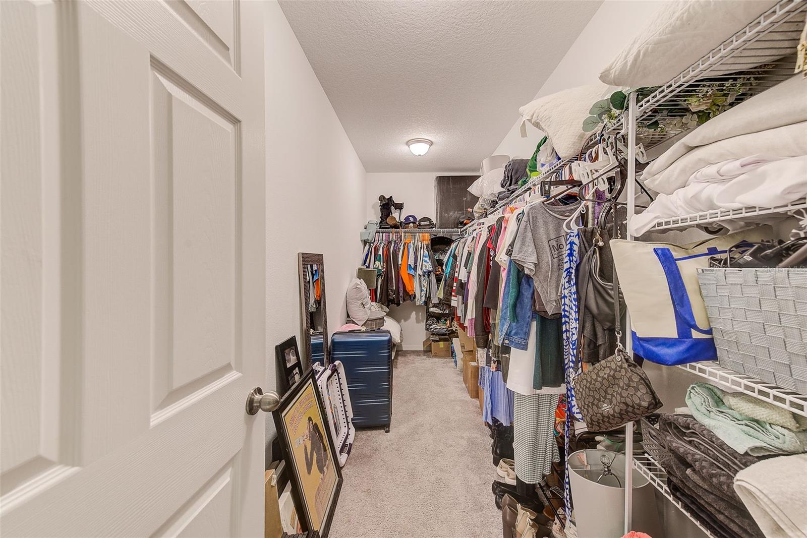 MASTER WALK IN CLOSET