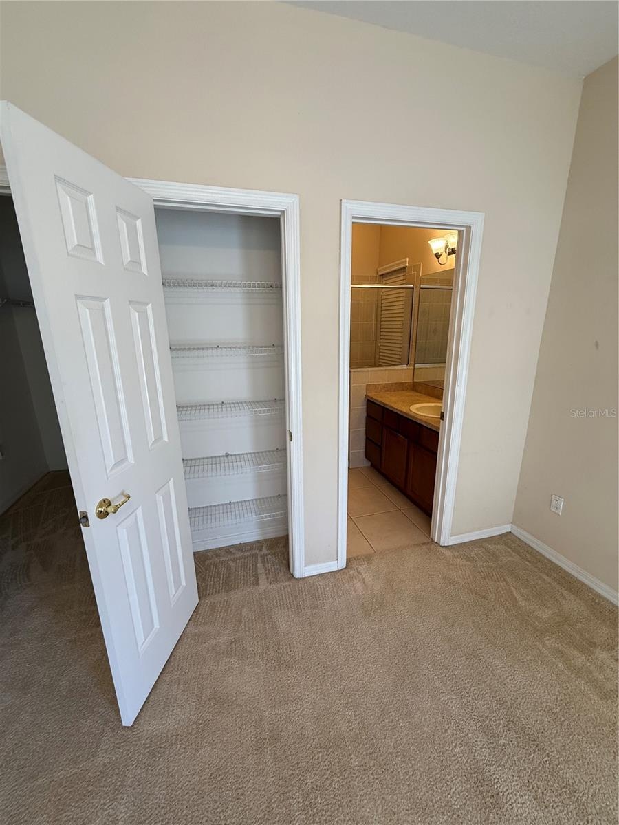 Primary Bedroom Linen Closet and Bathroom