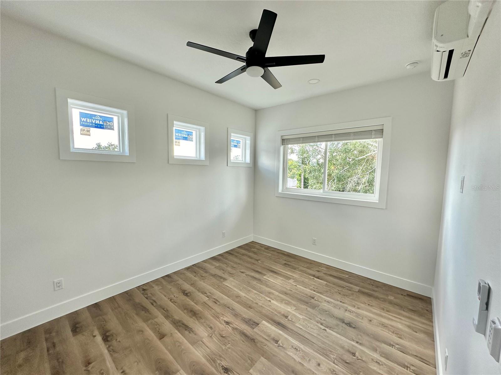 Bedroom with mini-split AC unit and 10 ft ceilings (ADU)