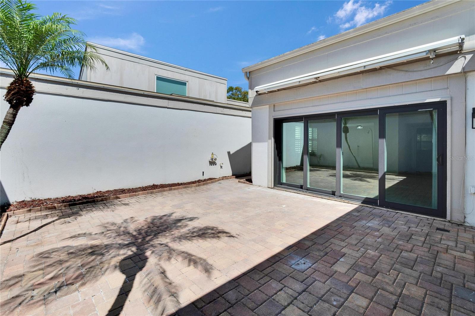 Patio with Electric retractable Awning