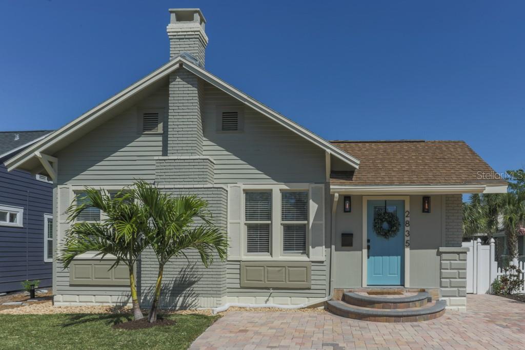 Front of home with fresh landscaping