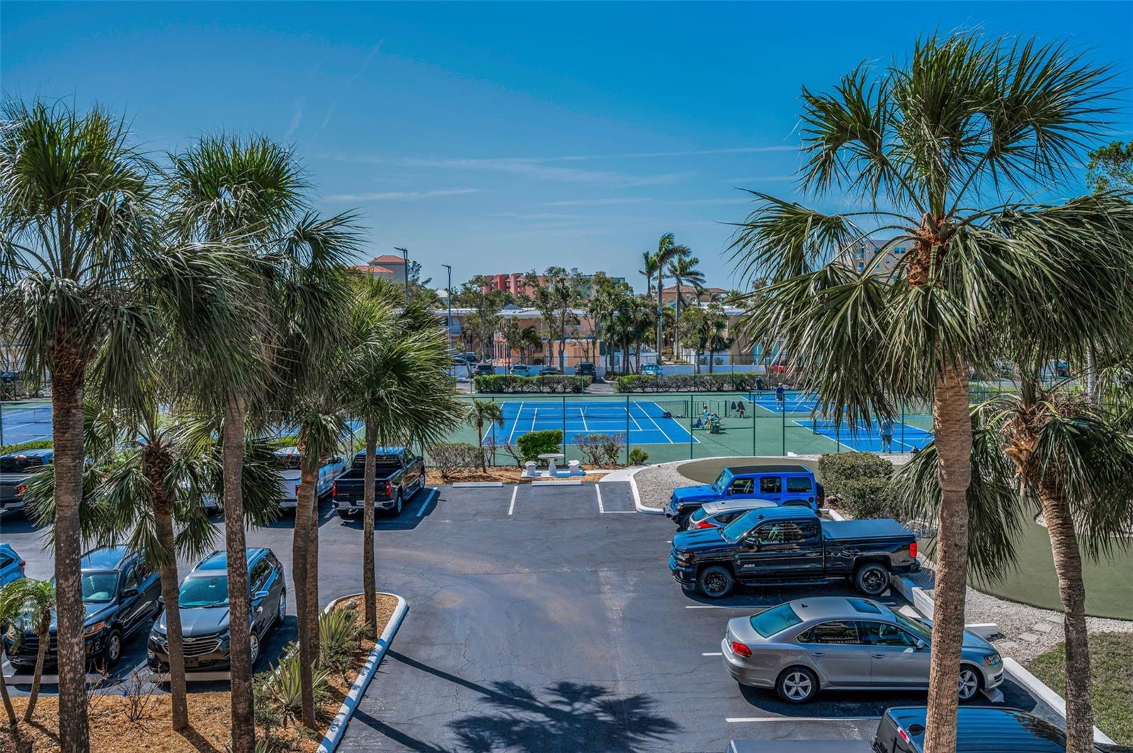 .. View of Tennis Courts From Your Front Walkway.  Close By Parking Spot #301 - Empty Spot by Tennis Court.