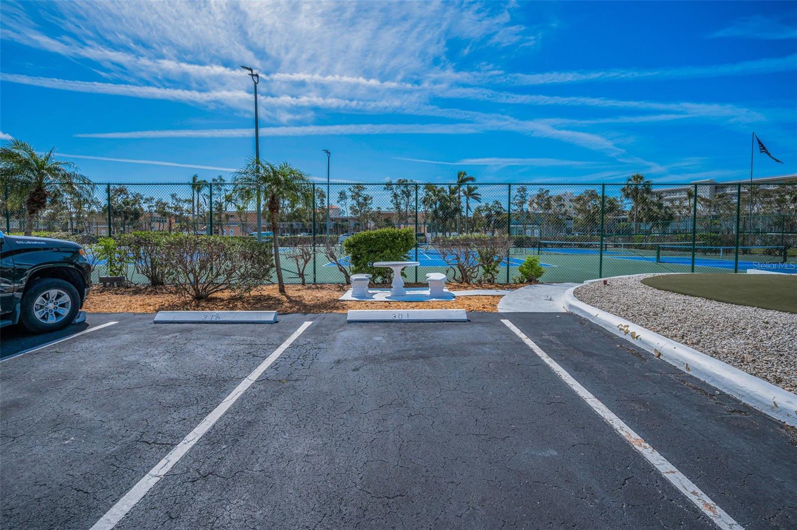 .. Assigned Parking Spot #301 on NW Corner of Tennis Courts. Short Walk to Elevator or Stairs Leading to Unit # 301. Complex just refurbished Tennis Courts and added Pickle Ball Courts Due to Demand.