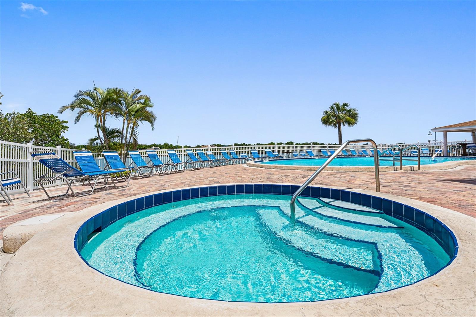 .. Shot of Hot Tub & Heated Pool. This Photo Was Taken Right before they Remodeled the Tiki Hut..