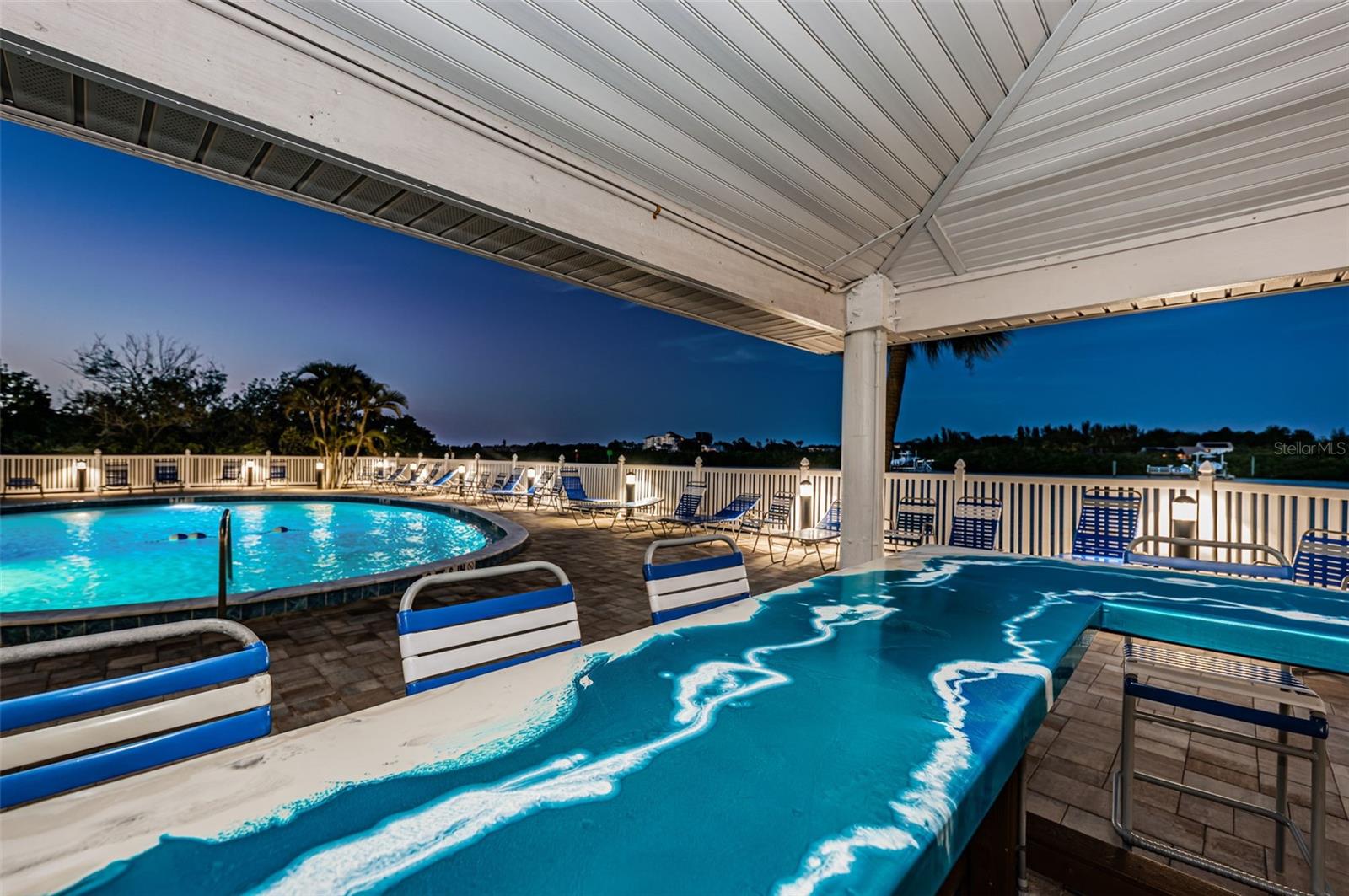 .. Night Shot #2. Early Evening at BSY&Tennis Club.. Heated Pool & Hot Tub on Left.