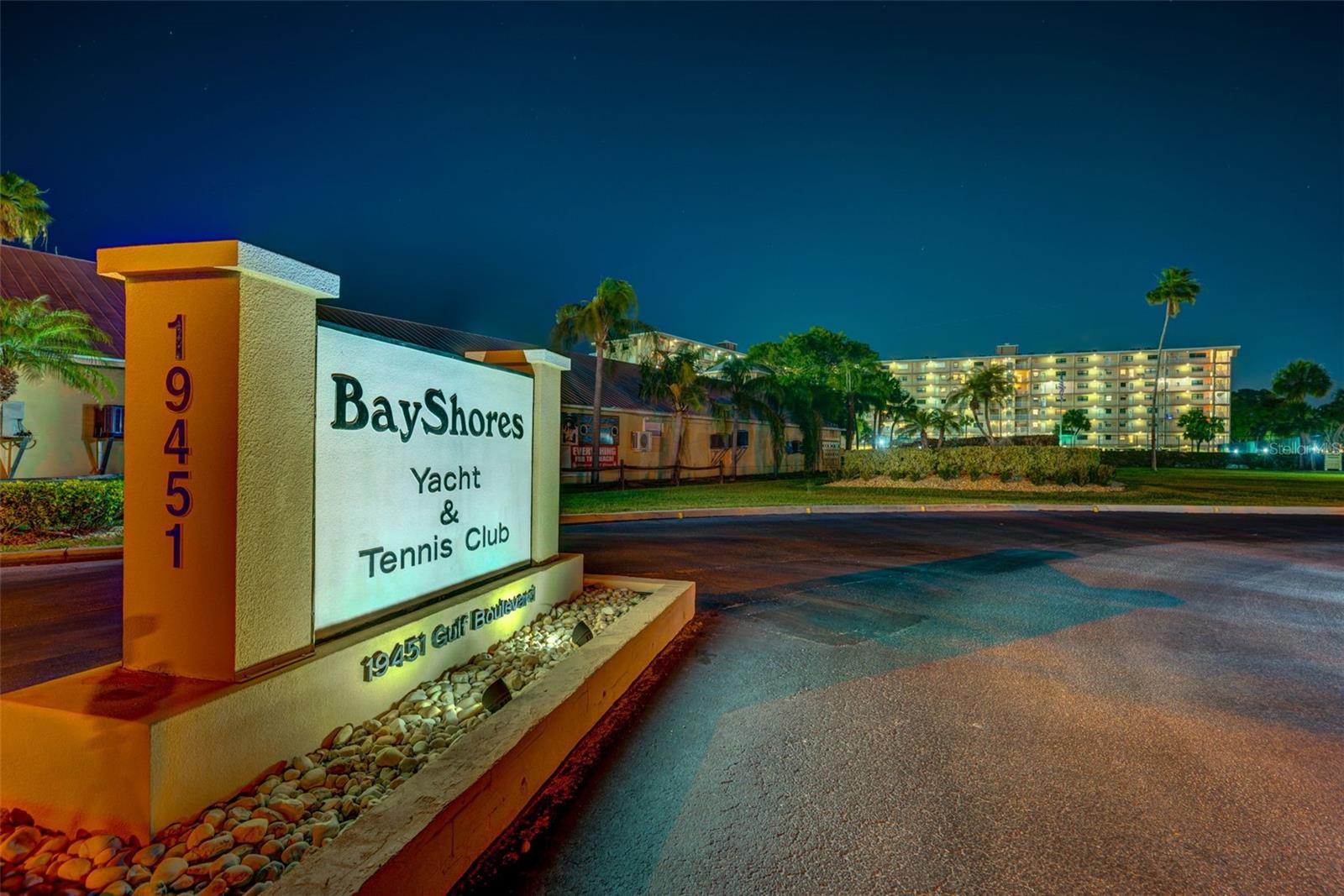 ... Night Shot of Entrance.. 19451 Gulf Blvd.. When the Elders Developed this Land, They has a Deeded Access to The Beach Granted to the Complex. Thereby Always Having Beach Access Directly Across the Street. It can Never Be Moved.