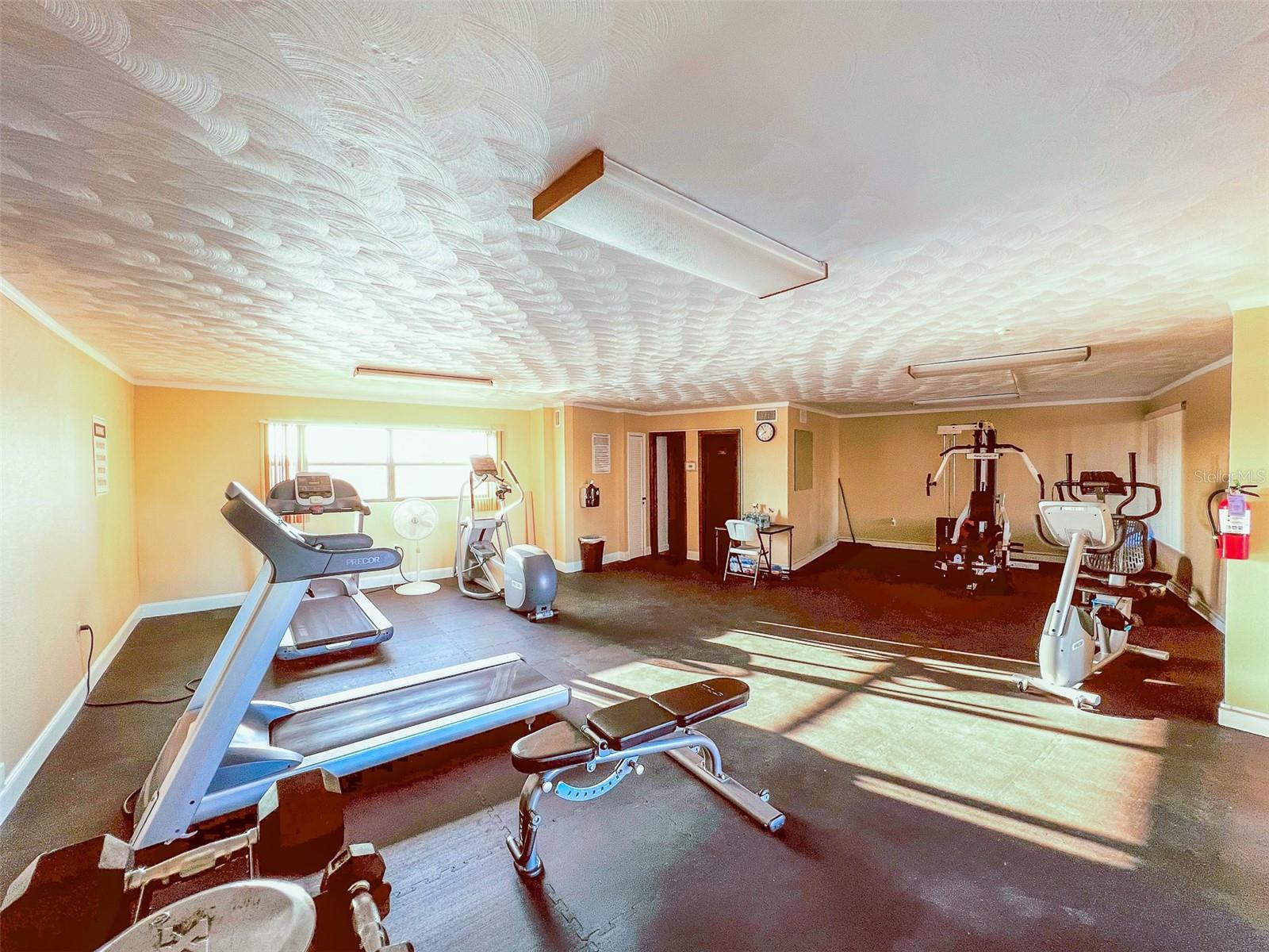 .. Amenities: Workout Facility.. There is a Little Fee To Use The Gym Facility Until The Equipment is Paid For.