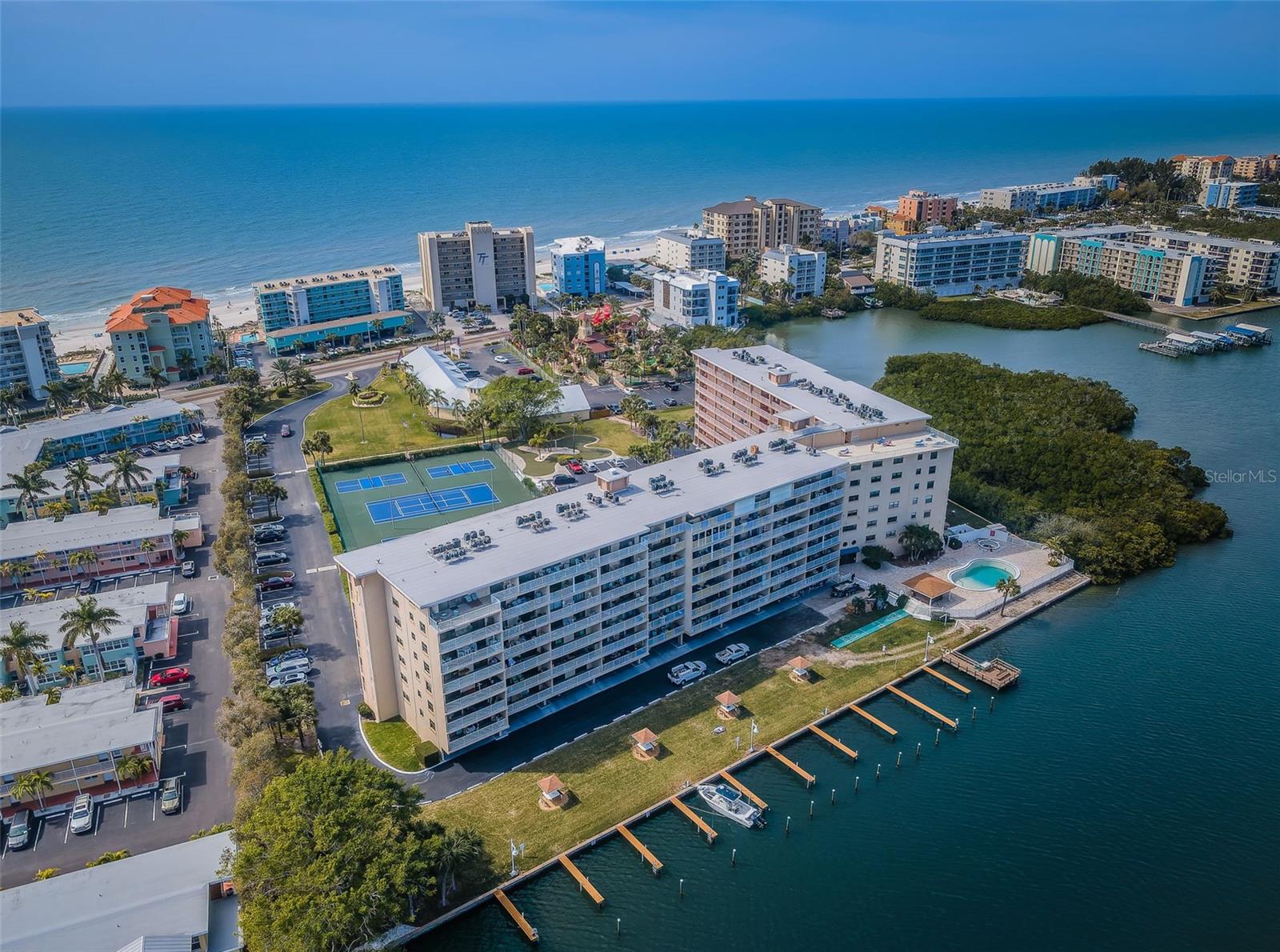 .. Nice Shot of Complex Looking West. Beach Access Right Across the Street. NOTE: Miniature Golf Right in Front of Complex.. No Driving.