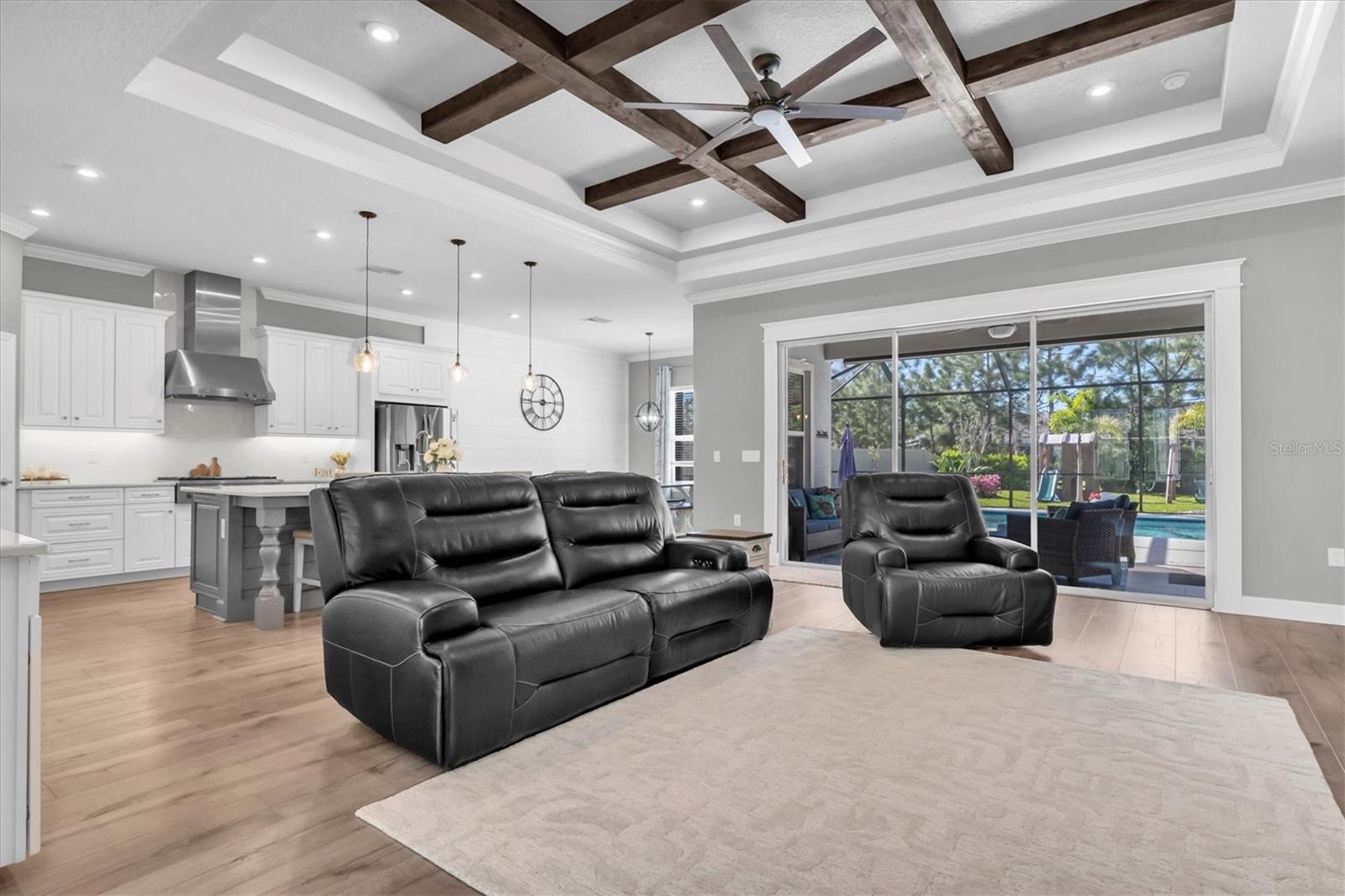 LIVING ROOM WITH WOOD BEAMS