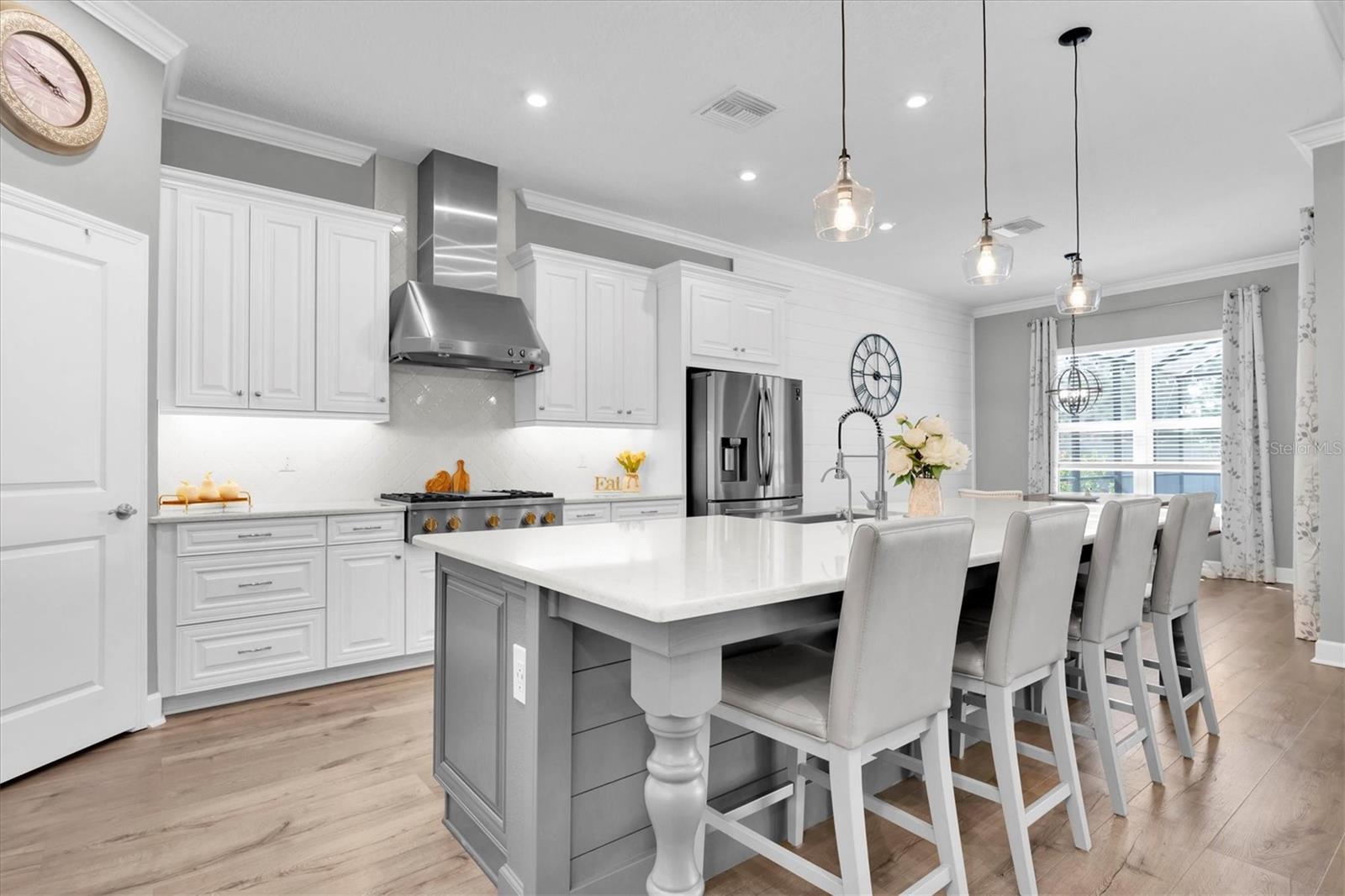 IMPRESSIVE KITCHEN OFFERS PLENTY OF CABINETS AND DRAWER STORAGE