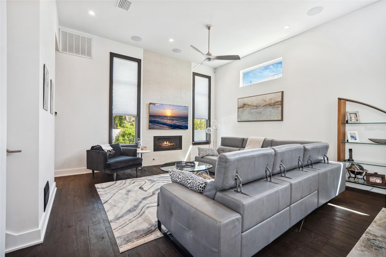 Gas fireplace accents the living room.