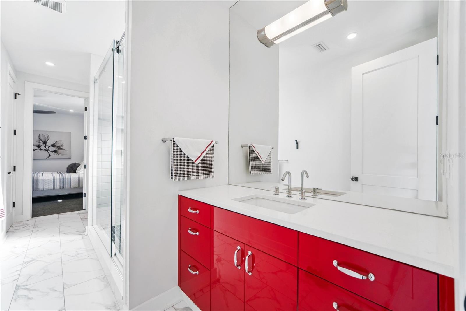 Jack and Jill guest bathroom joins the two second floor guest bedrooms.