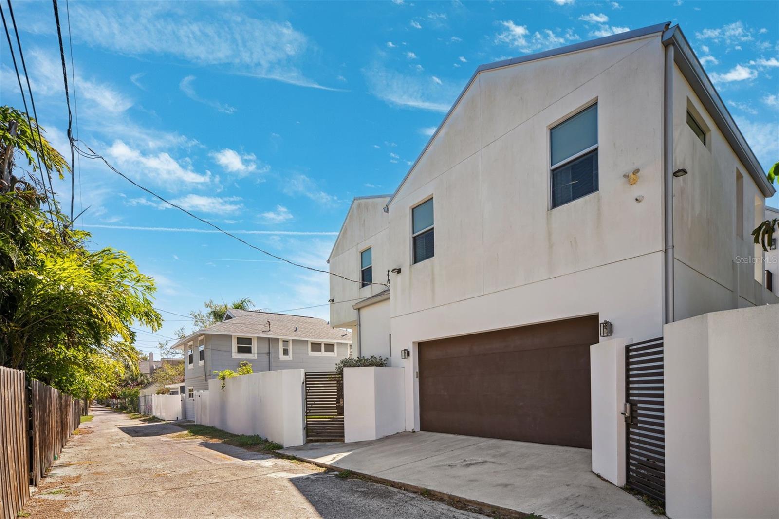 Rear alley access to your private two car garage.