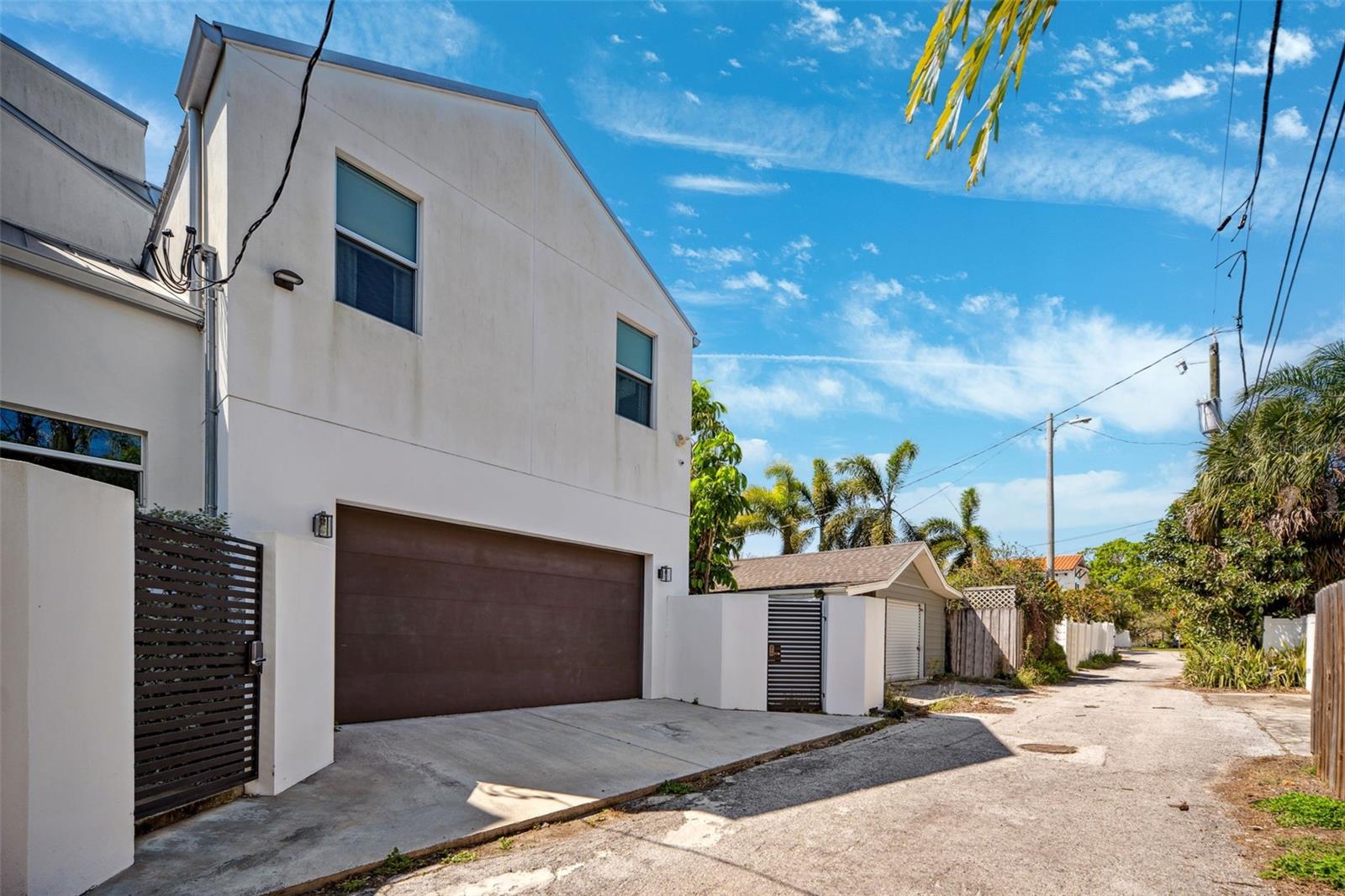 Alley access and garage is a perfect place to store your golf cart.