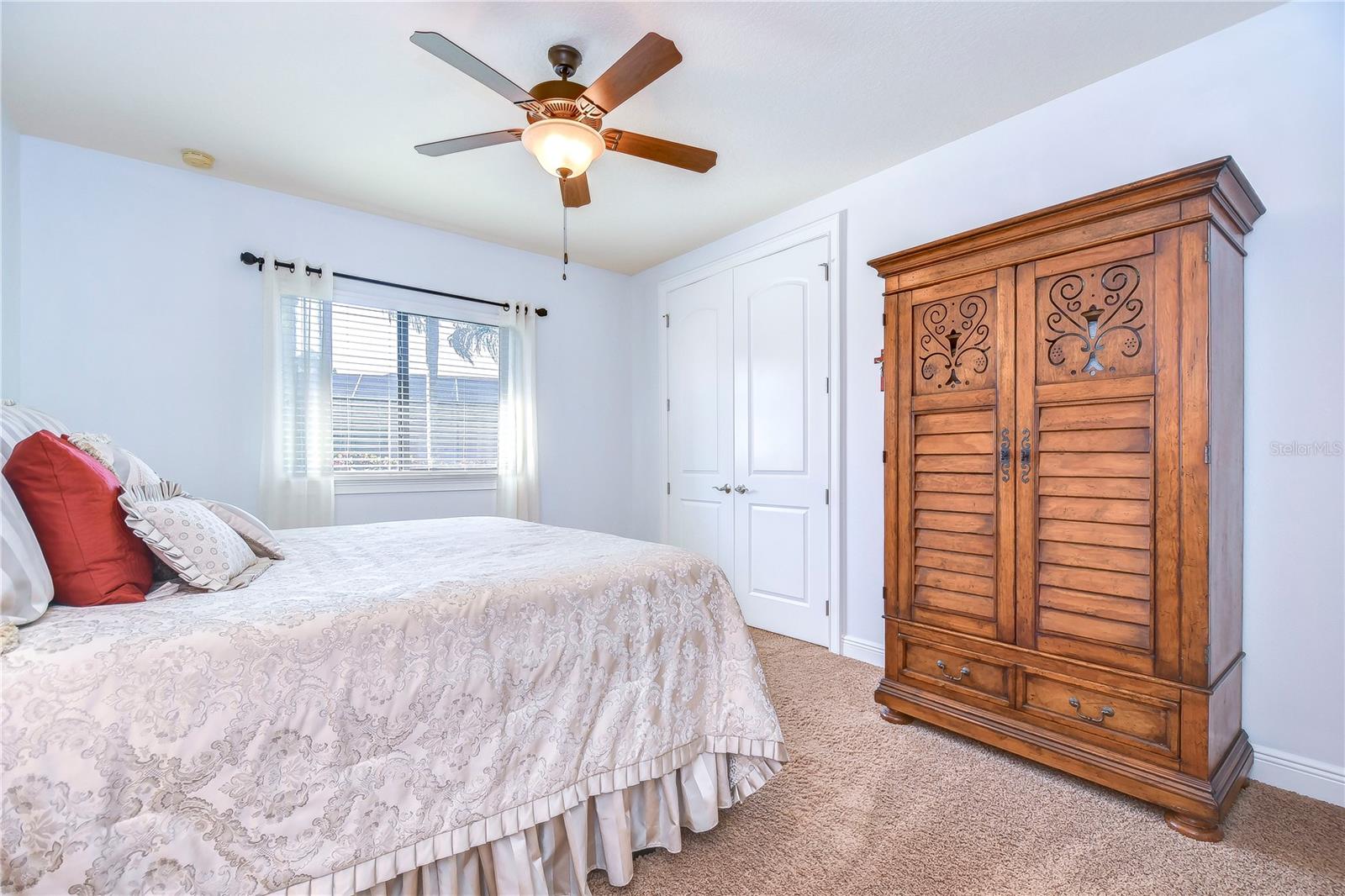 Step into serenity with this charming bedroom.