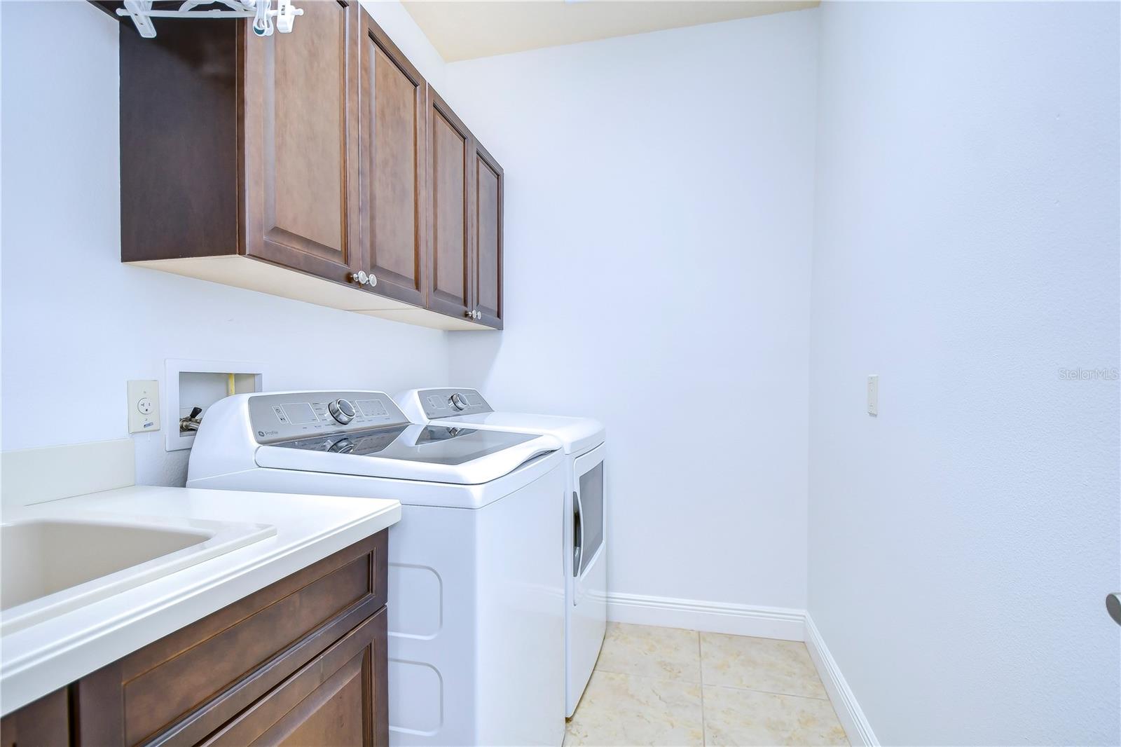 This sleek, modern laundry room promises to make even washing day a breeze.