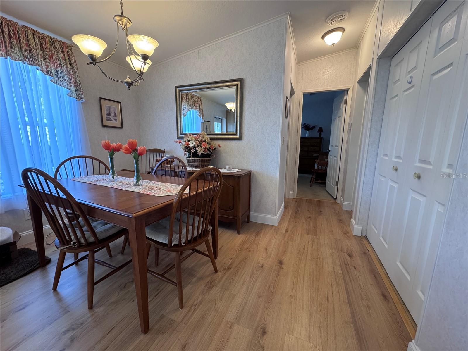 Dining room and hallway that takes you to the two bedrooms.