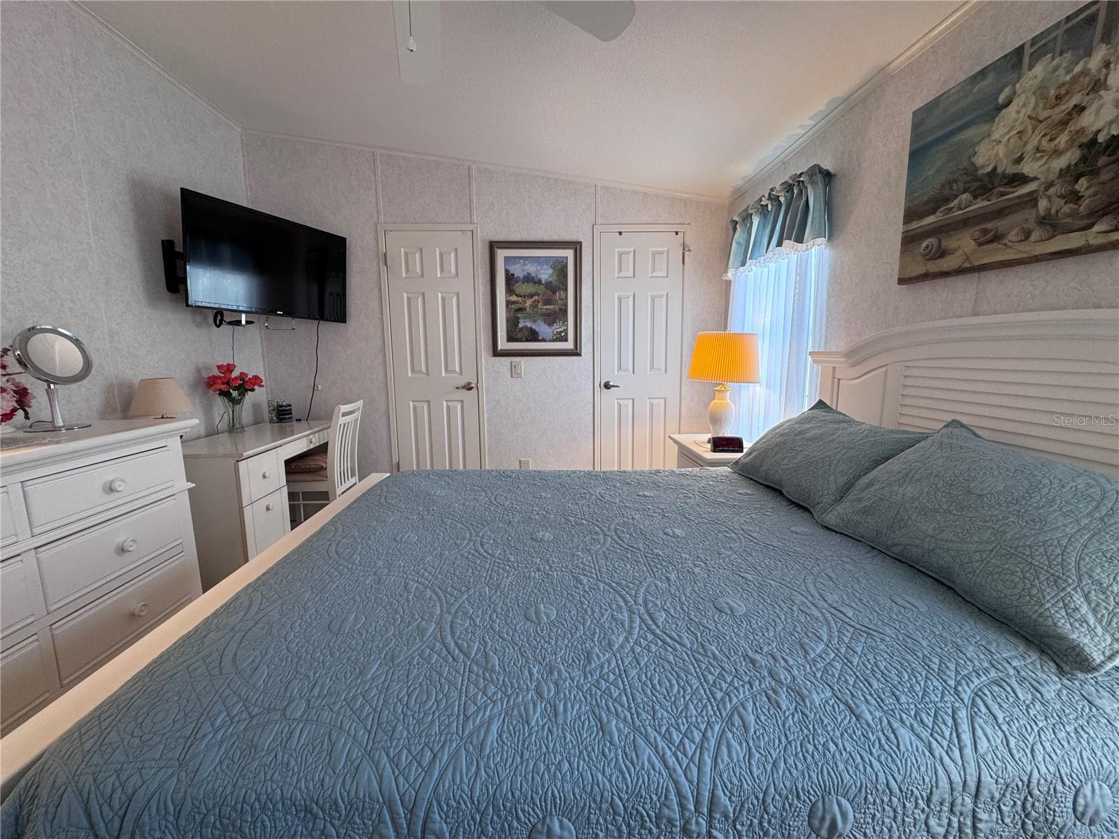 Two built in closets in this primary bedroom.