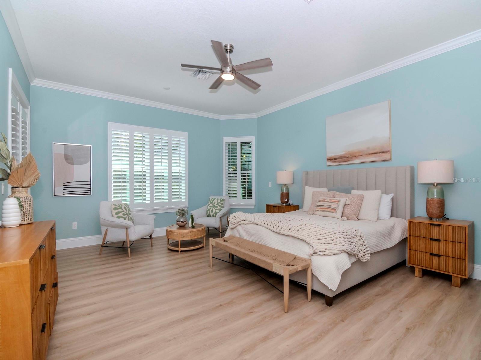 Expansive primary bedroom, sitting area