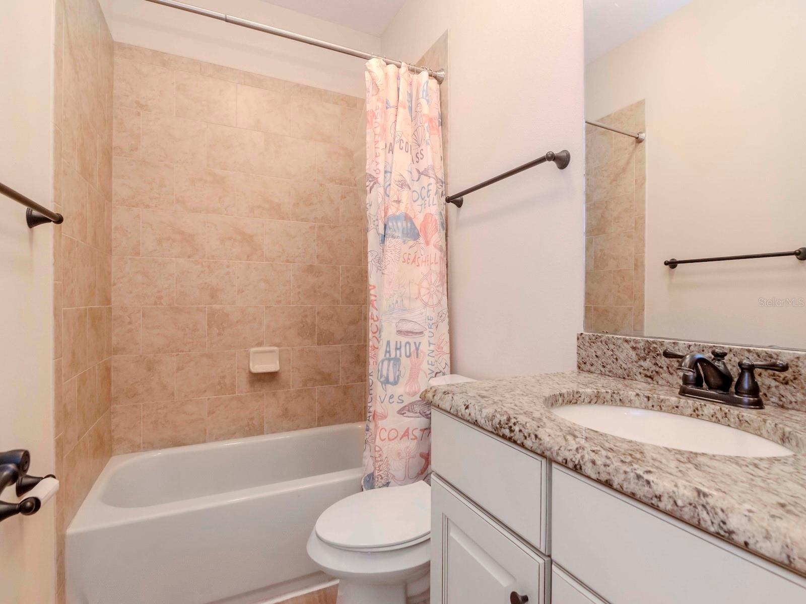 Full bathroom upstairs, granite tops