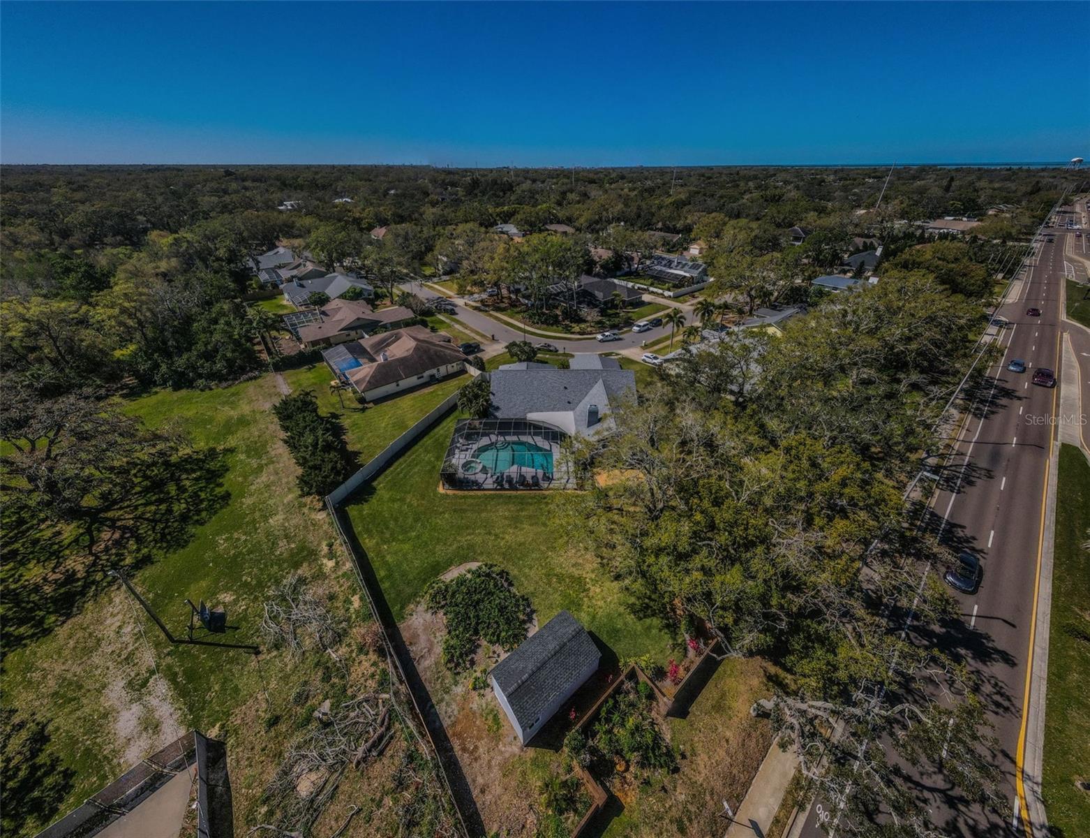 Completely fenced private .55 acre homestead with so much to offer.  A private 12'W x 22'L Shed with electricity, air conditioning, and wi-fi.  A man's dream.  A perfect office and room for storage.