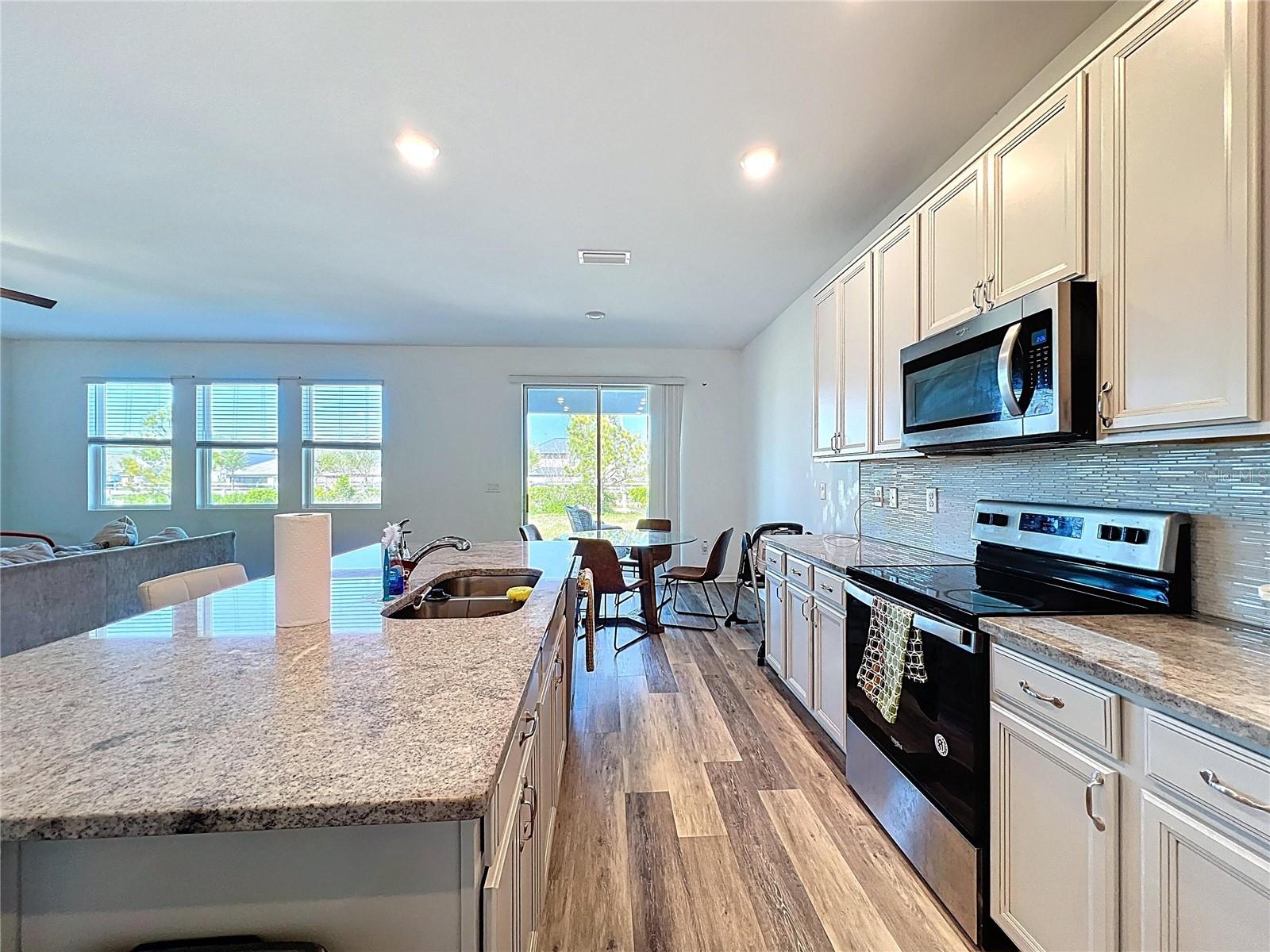 Open concept with eat-in kitchen and family room