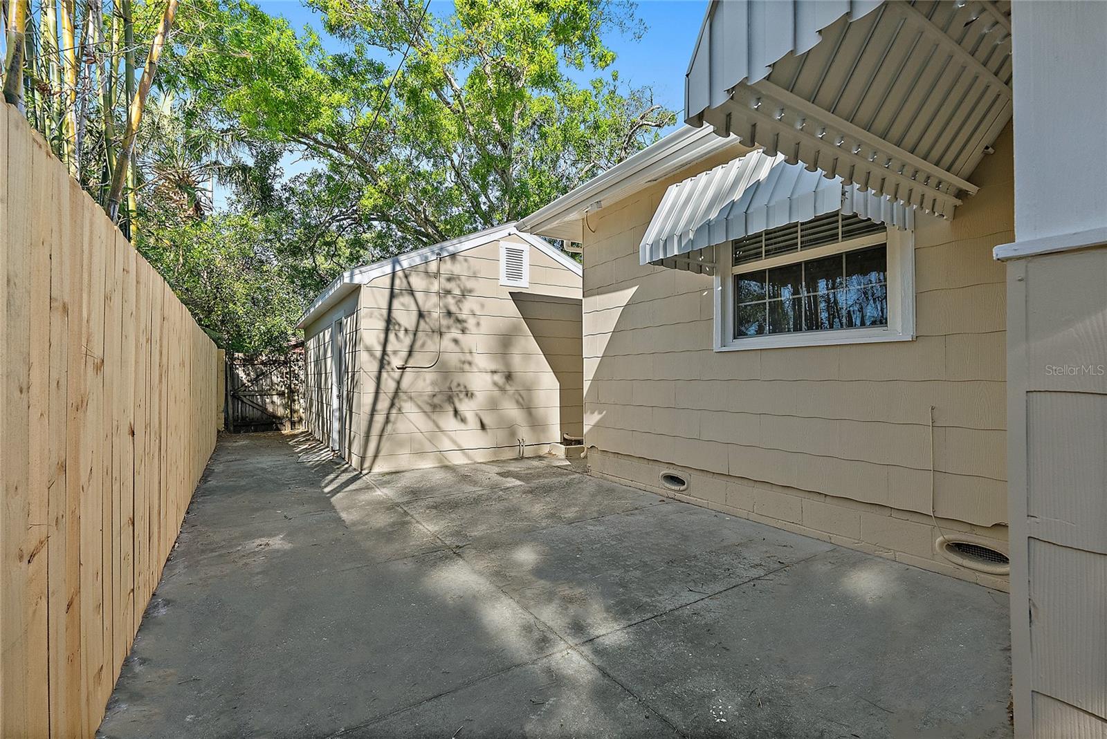 Open patio walkway to garage