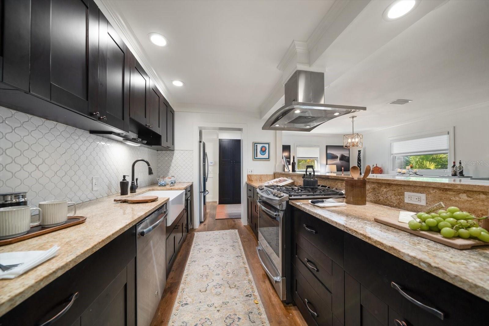 Stainless Steel Appliances and Custom Tile Backsplash