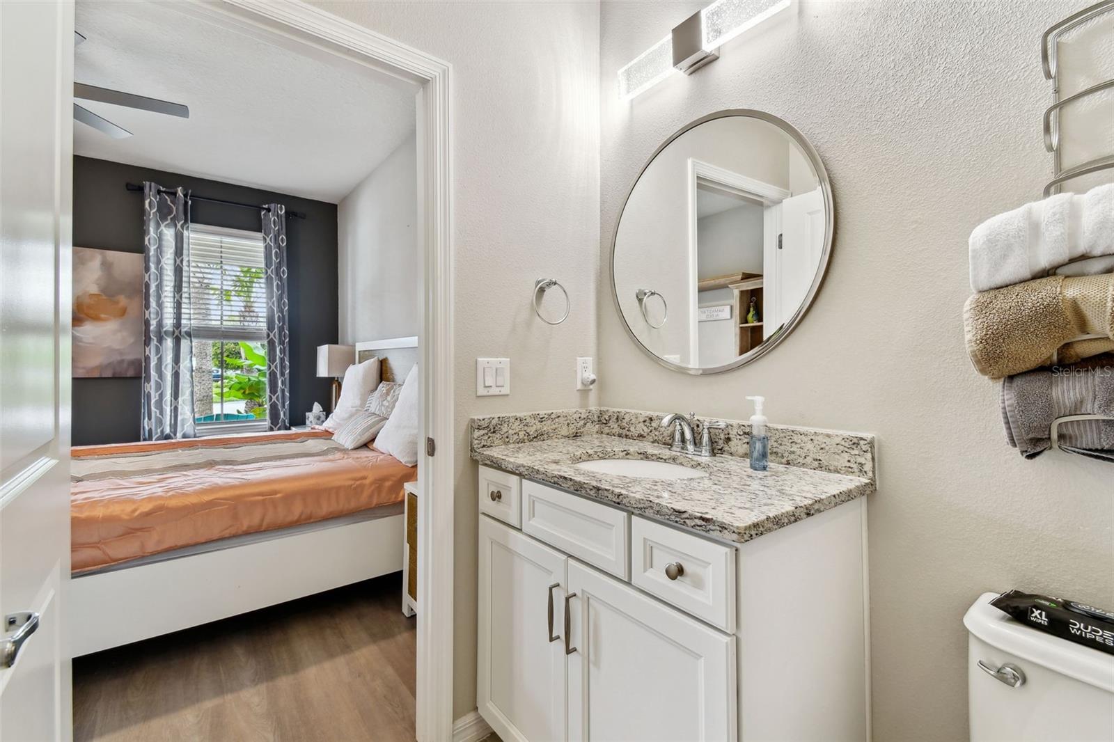 First floor guest bedroom with attached bath