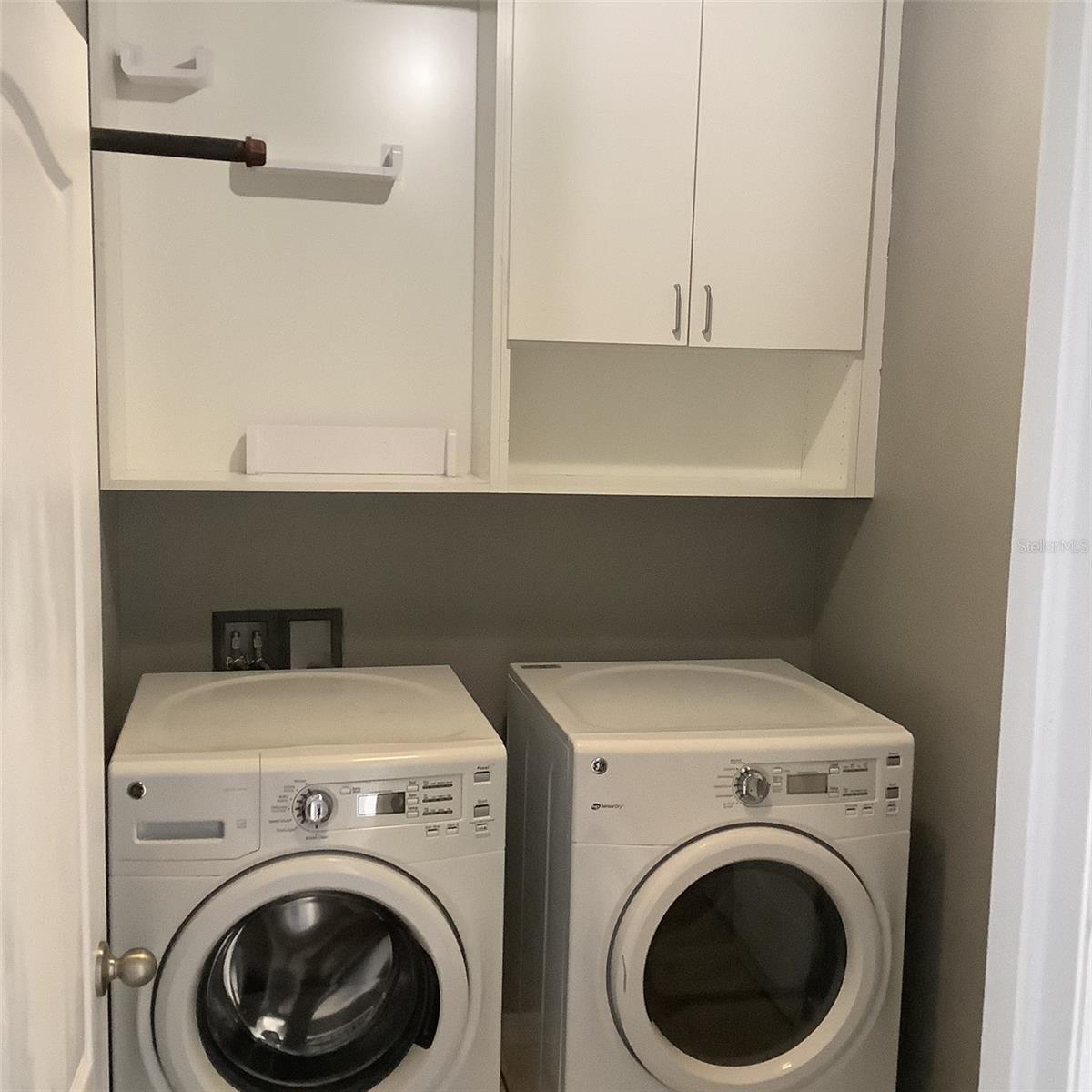 Laundry Room with Custom Cabinets