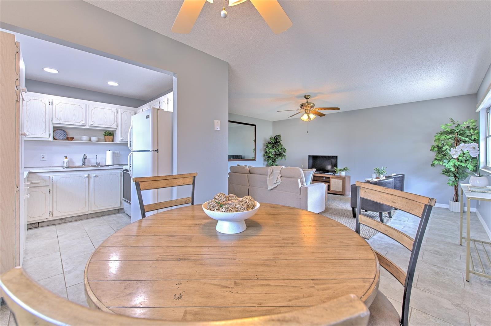 Dining area looking into Living Room and Kitchen