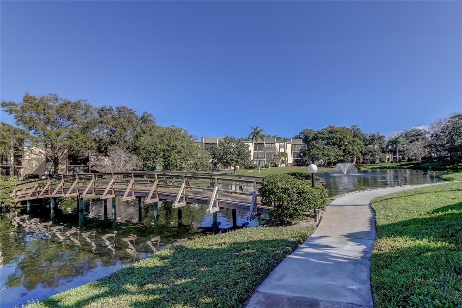 Take a nice walk over the quaint bridge at Lakeview of Largo