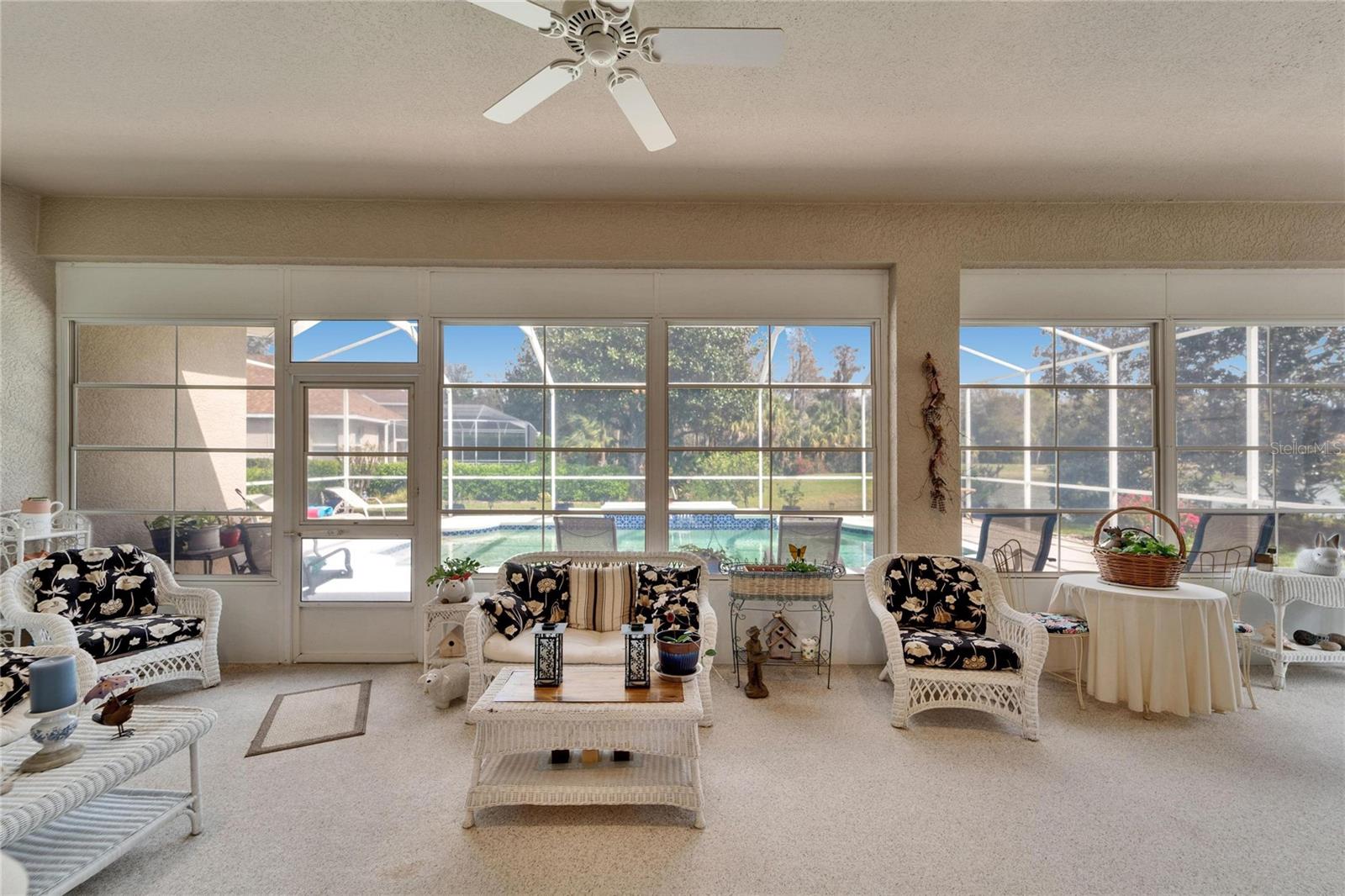 Enclosed porch with ceiling fan. Room is not heated or cooled.