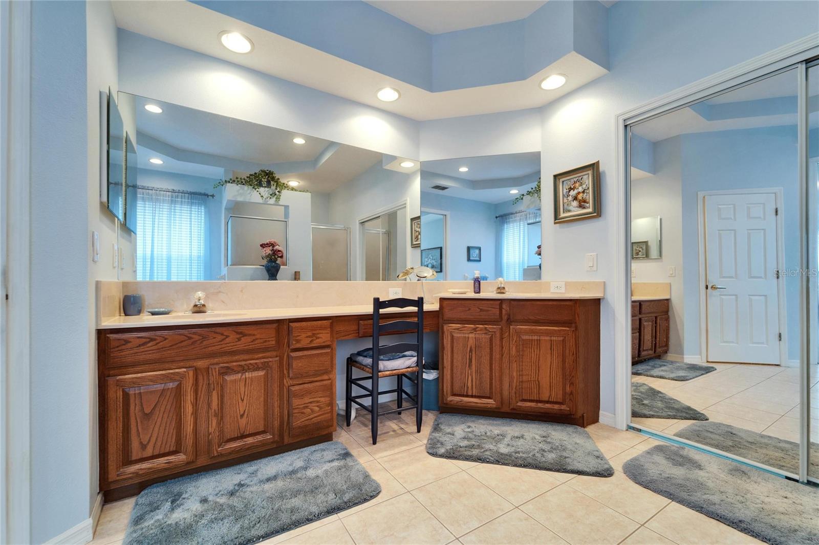 Large Walking Closet Behind the Sliding Mirror Doors.