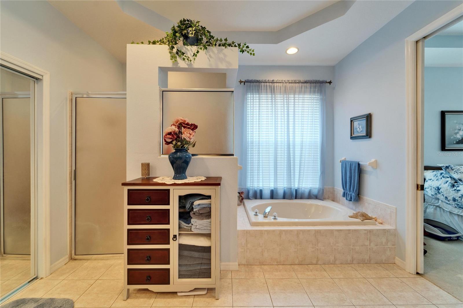 Primary Bathroom is huge with garden tub and separate shower.