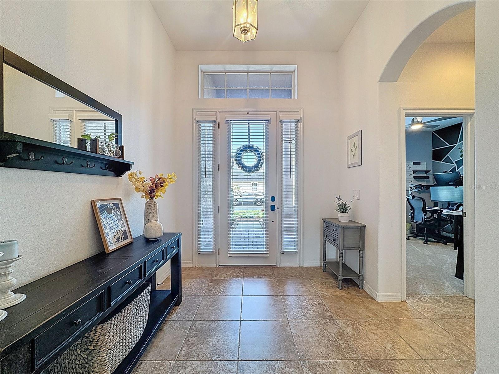 SPACIOUS INTERIOR HIGH CEILINGS, ARCHWAYS AND COLUMNS TO ENHANCE THE HOME!