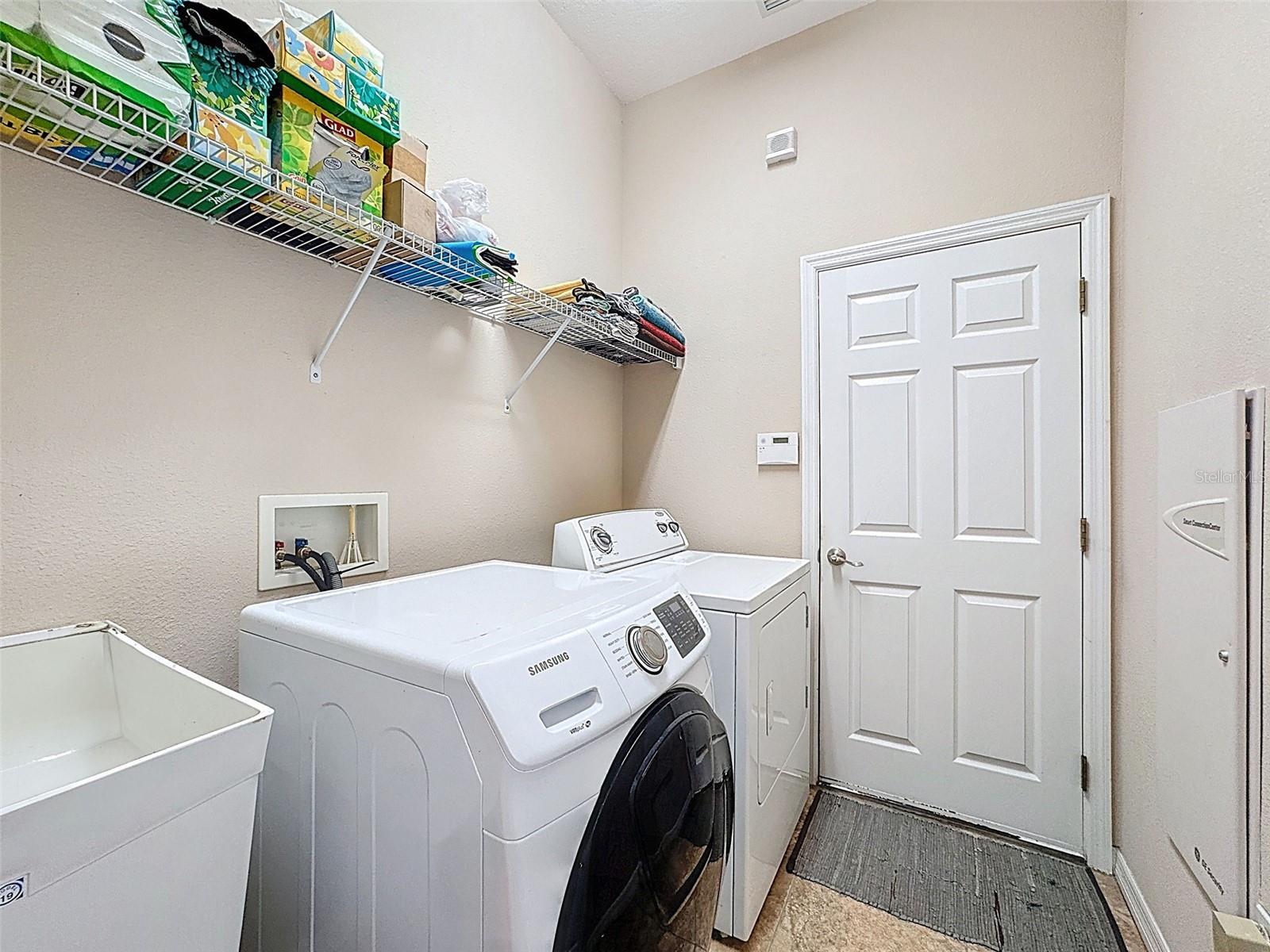 LAUNDRY AREA TO THE GARAGE