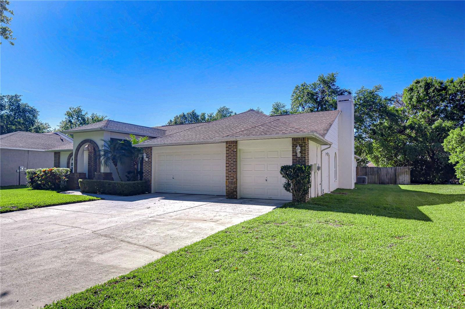 Enjoy the expansive driveway and inviting layout, perfect for leisurely weekends and family gatherings.
