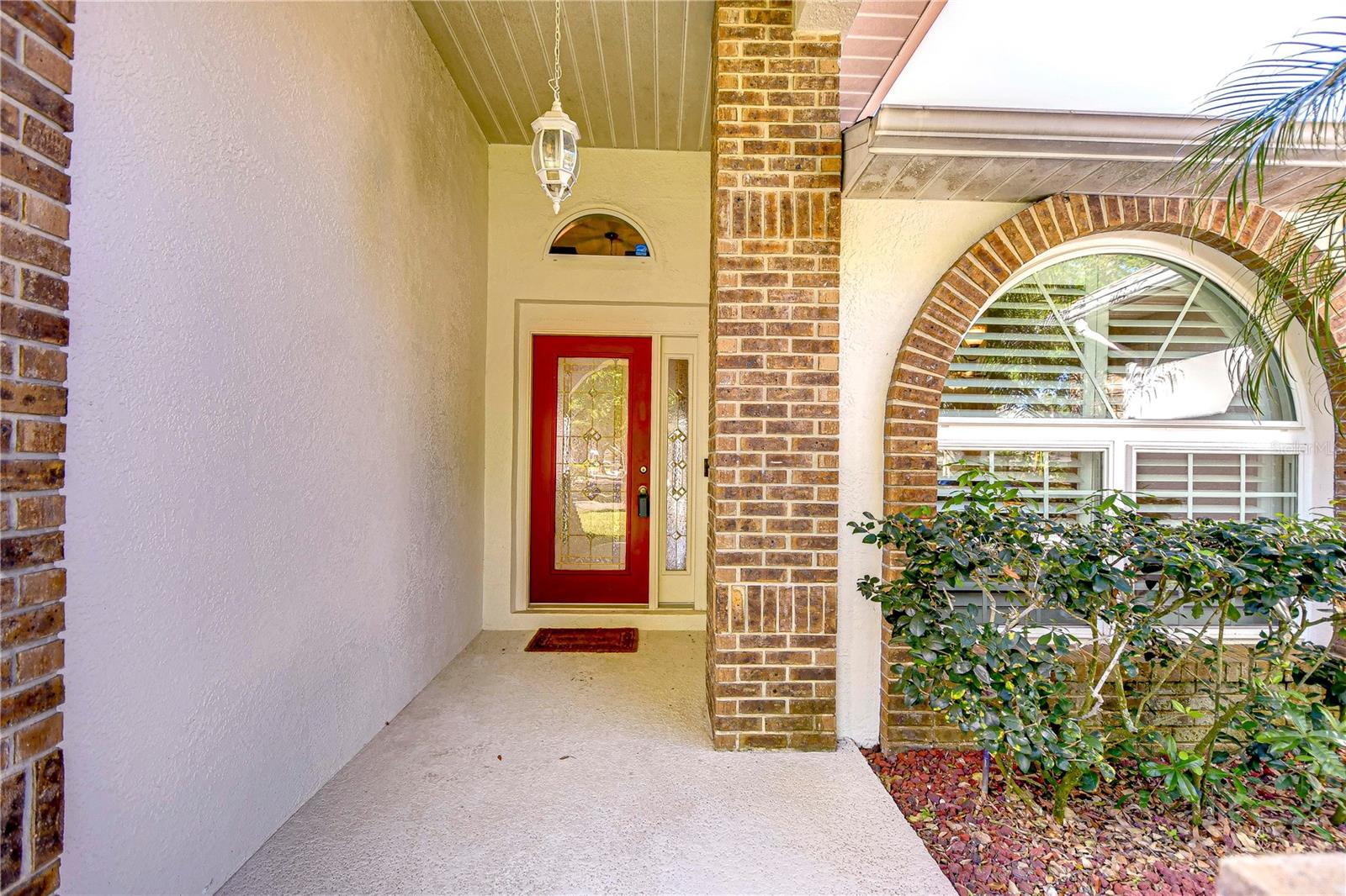 This inviting front porch sets the stage for what lies beyond!