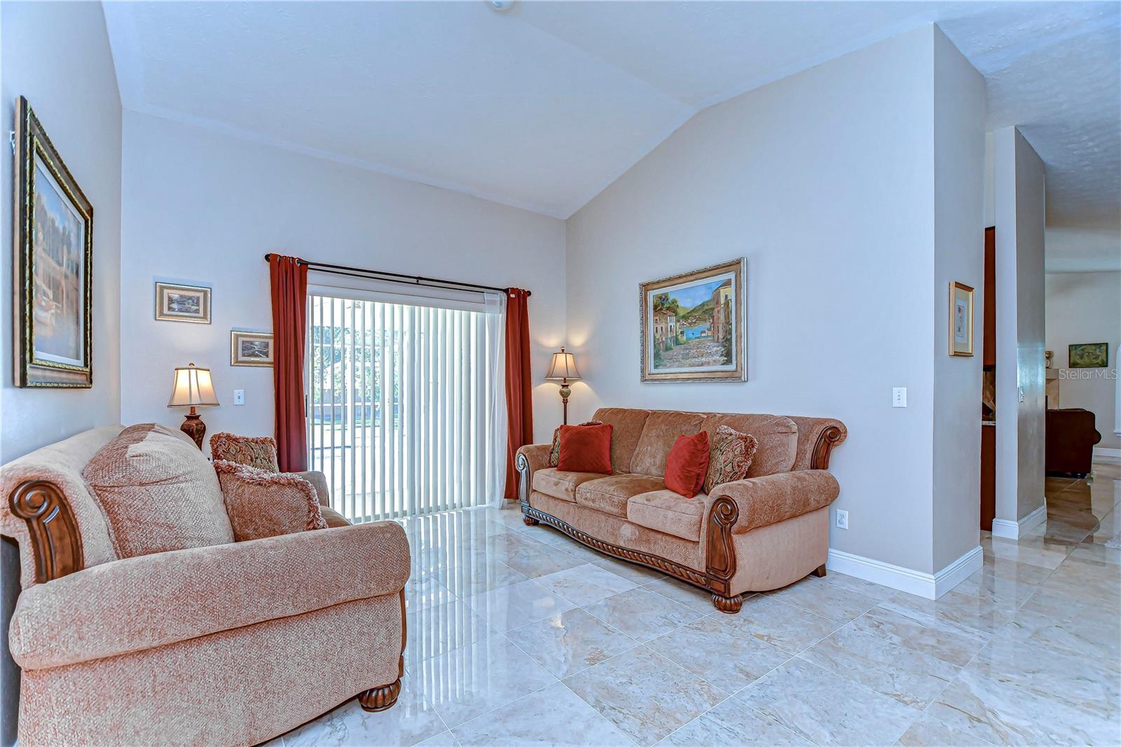 Perfect for cozy conversations or curling up with a good book, this inviting room blends charm and comfort, offering a serene retreat from the bustle of everyday life.