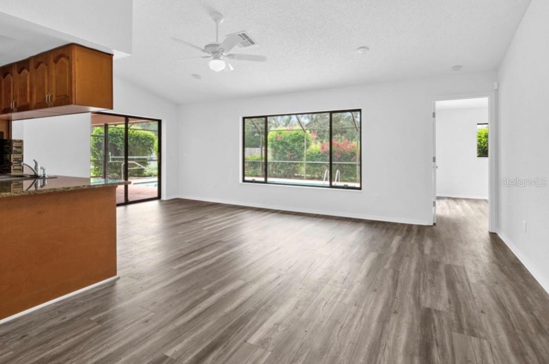 The family room open to the kitchen which is great for entertaining