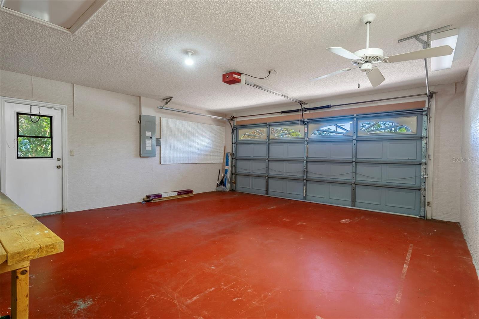 Huge two car garage, wiuth a garage door opener