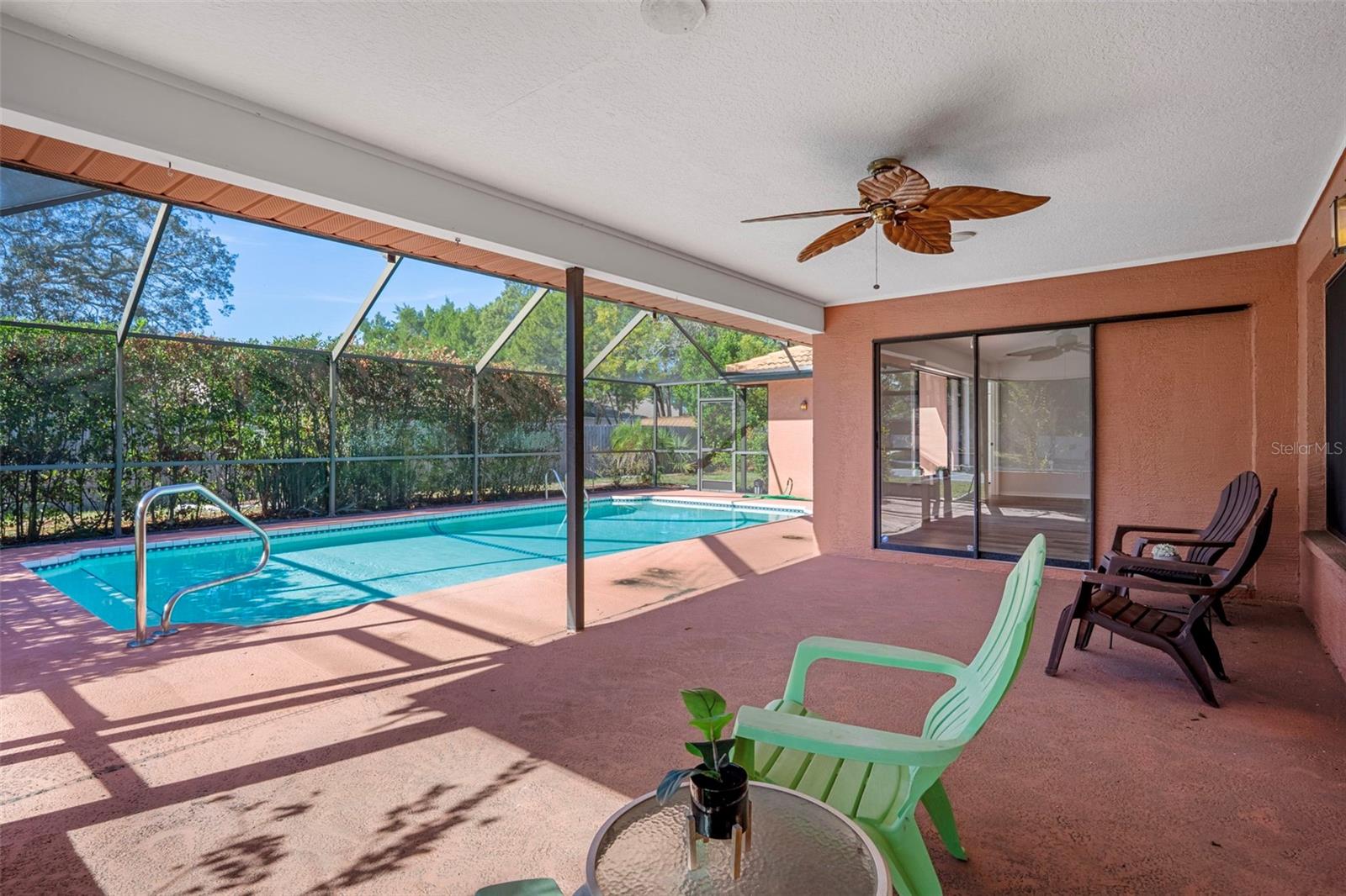 Porch with a view of the pool