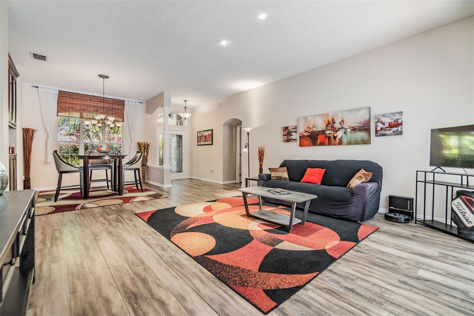 Formal Living Room, Laminate Flooring open to the pool/lanai.