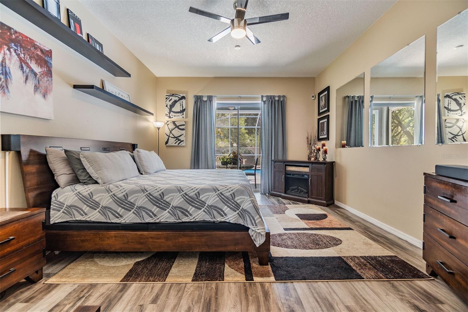 Master Bedroom, Ceiling Fan, View of the Pool/Lanai.