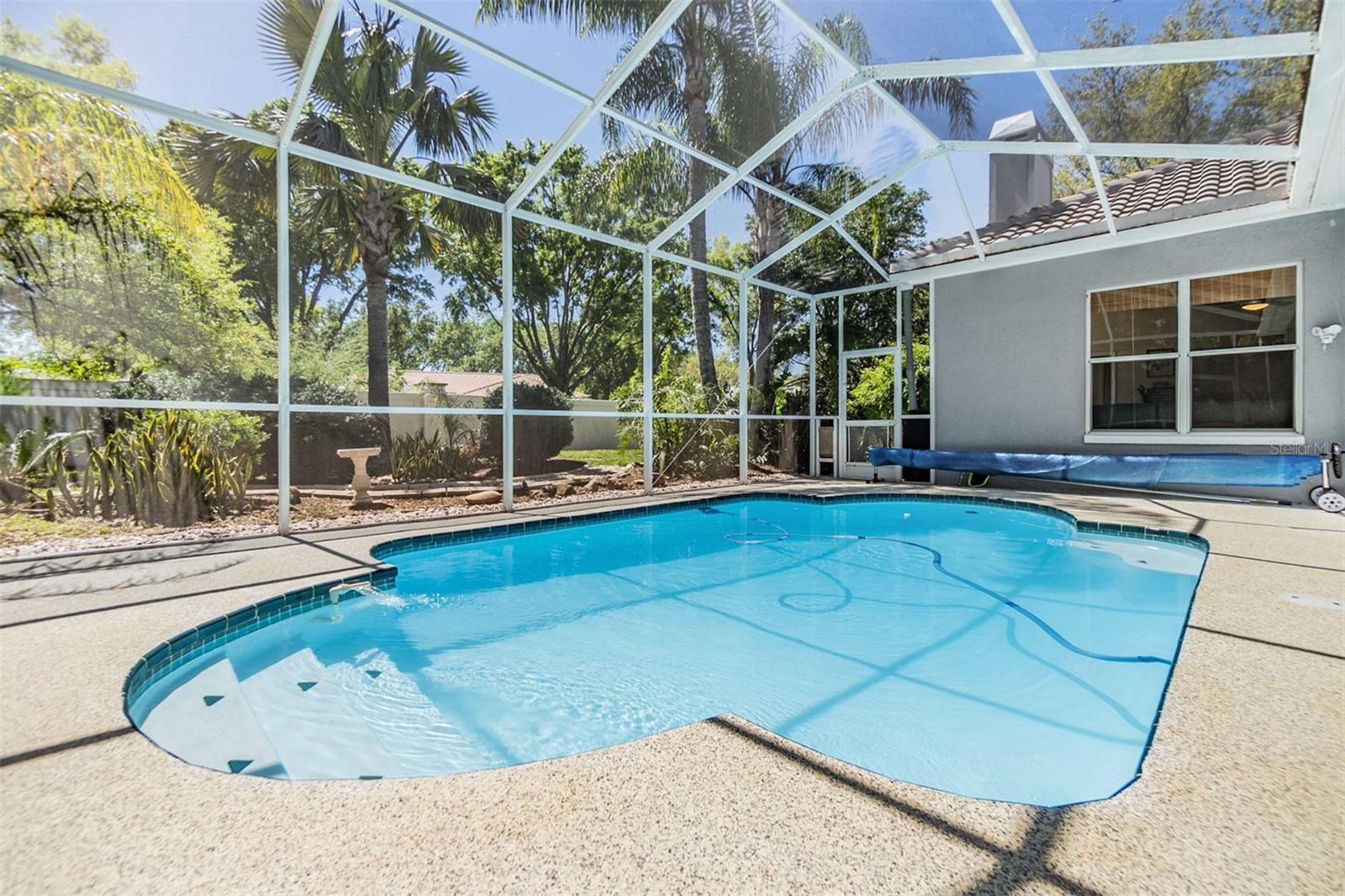 Pool/Lanai with Pool cover and roller