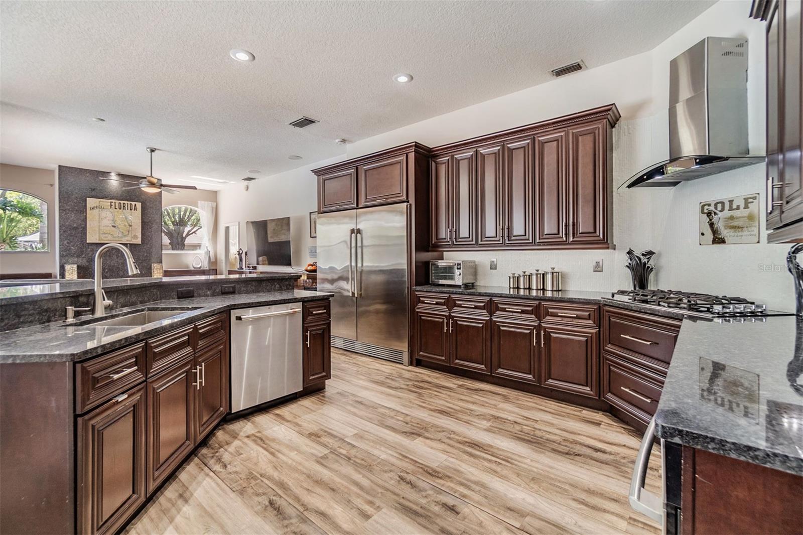 Updated Kitchen, New Backsplash, Huge refrigerator, Range and Range Hood, Dishwasher