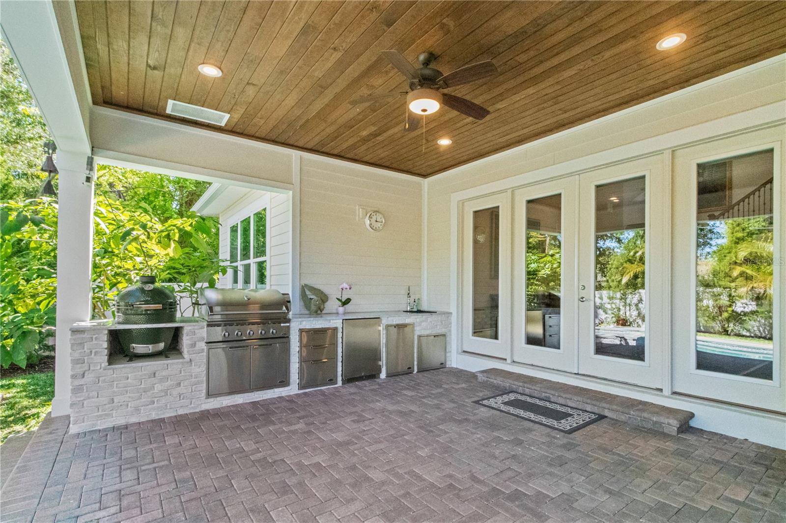 back patio with outdoor kitchen