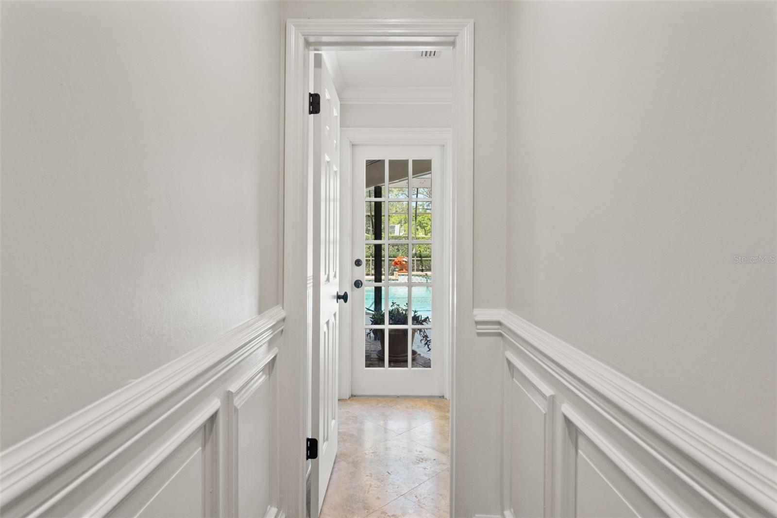 Custom Wainscoting Hallway to Full Pool Bath